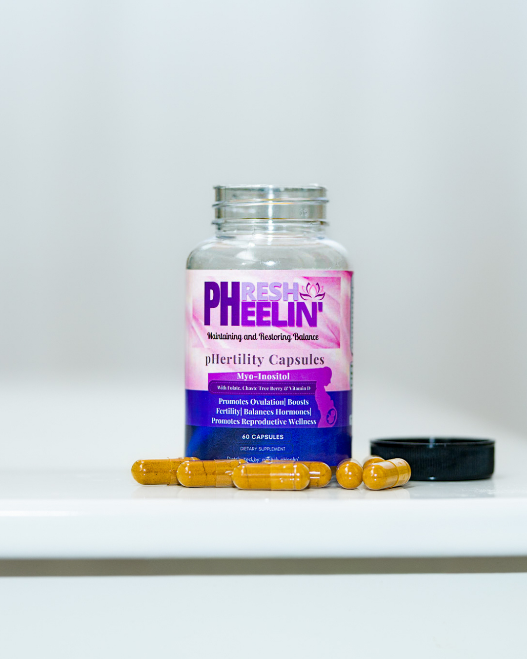 pHresh pHeelin' pHertility Capsules on a white surface with a white background. 